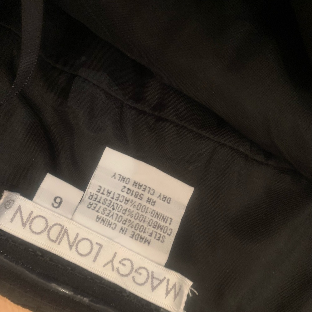 Black Maggie London halter tie dress.